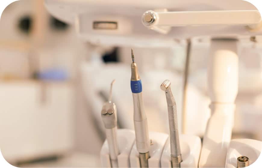 Dental tools and equipment in a dental clinic setting.